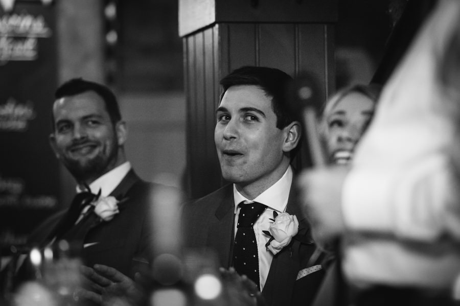 Groom reacting to speeches