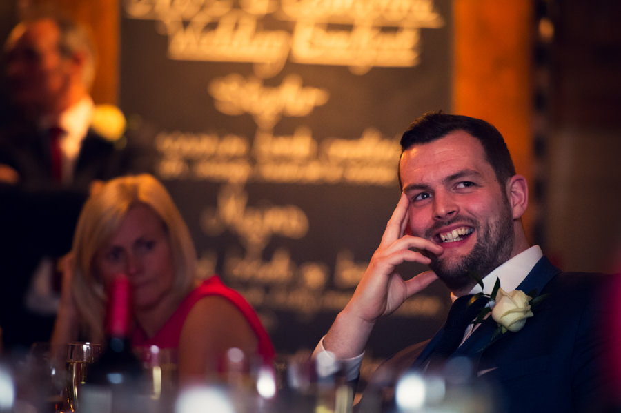 Guests listening to wedding speeches
