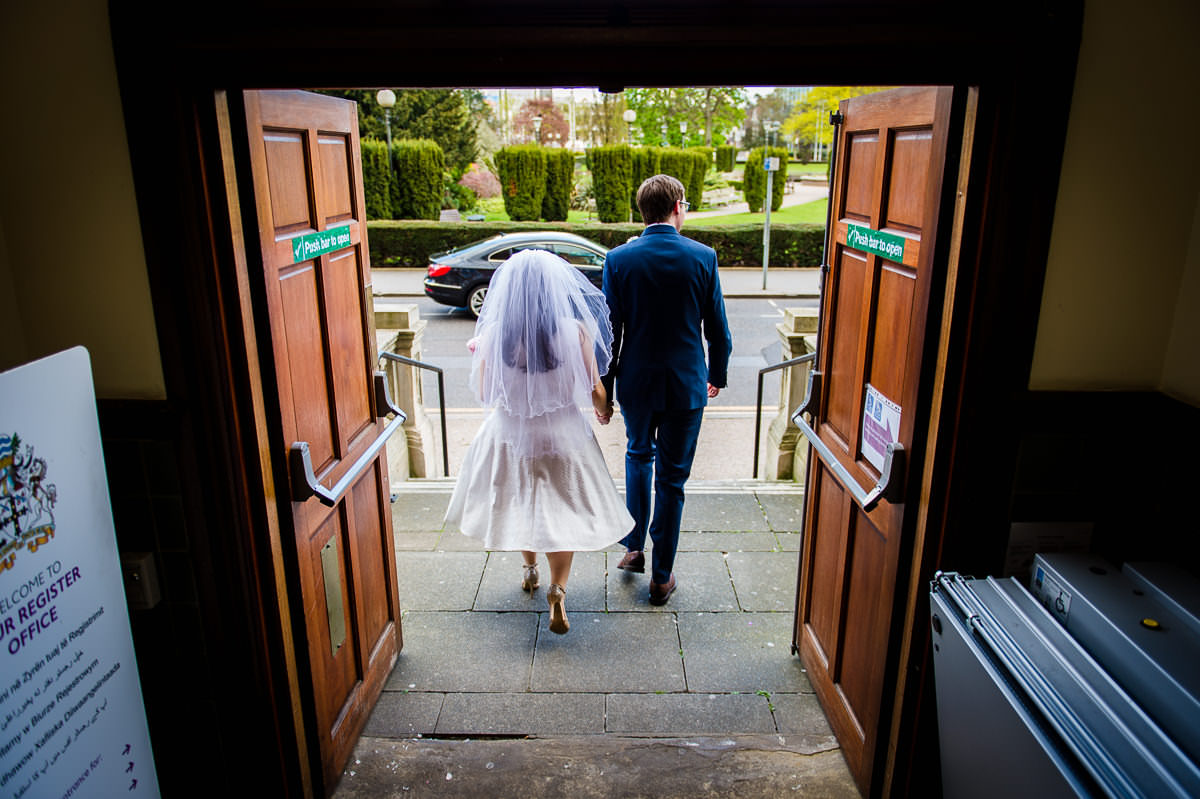 Bride and Groom leaving their wedding at croydon registry office