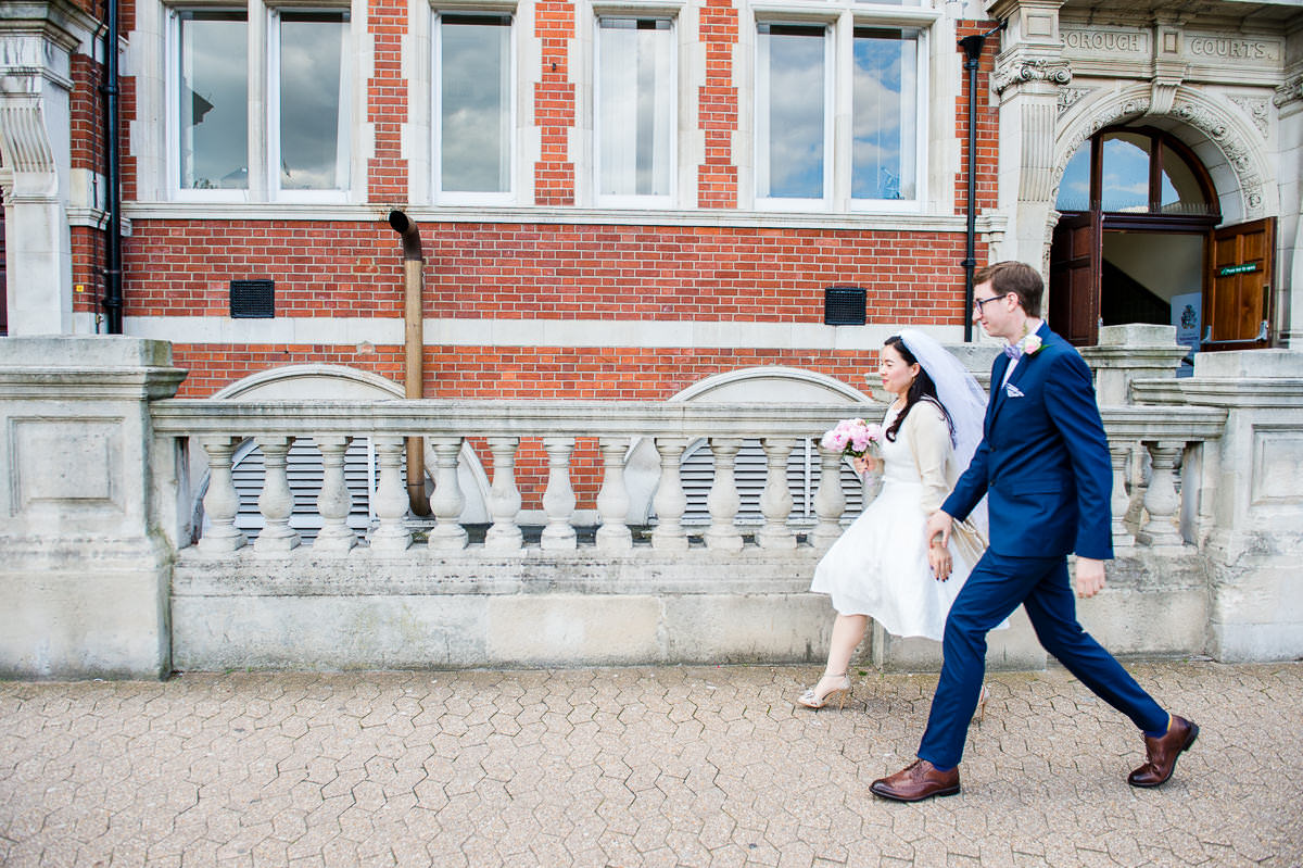 Bride and Groom entering Croydon Registry office for their wedding