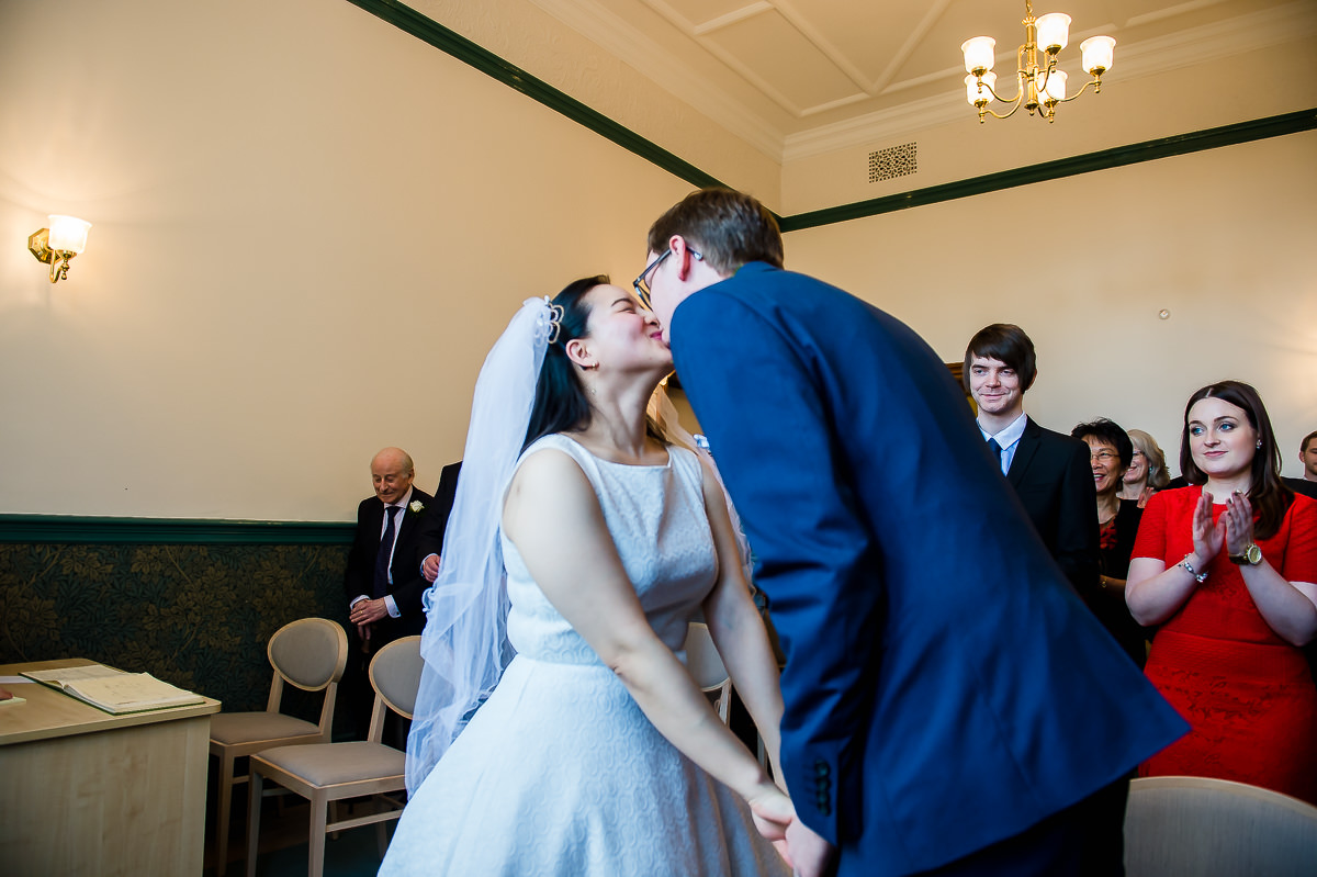 Newly weds kissing at their Croydon wedding