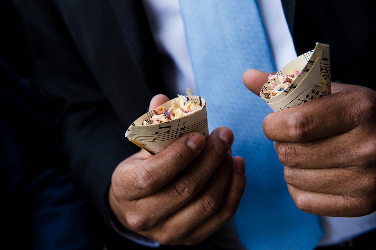 Town Hall Hotel wedding guest with confetti cones in his hands