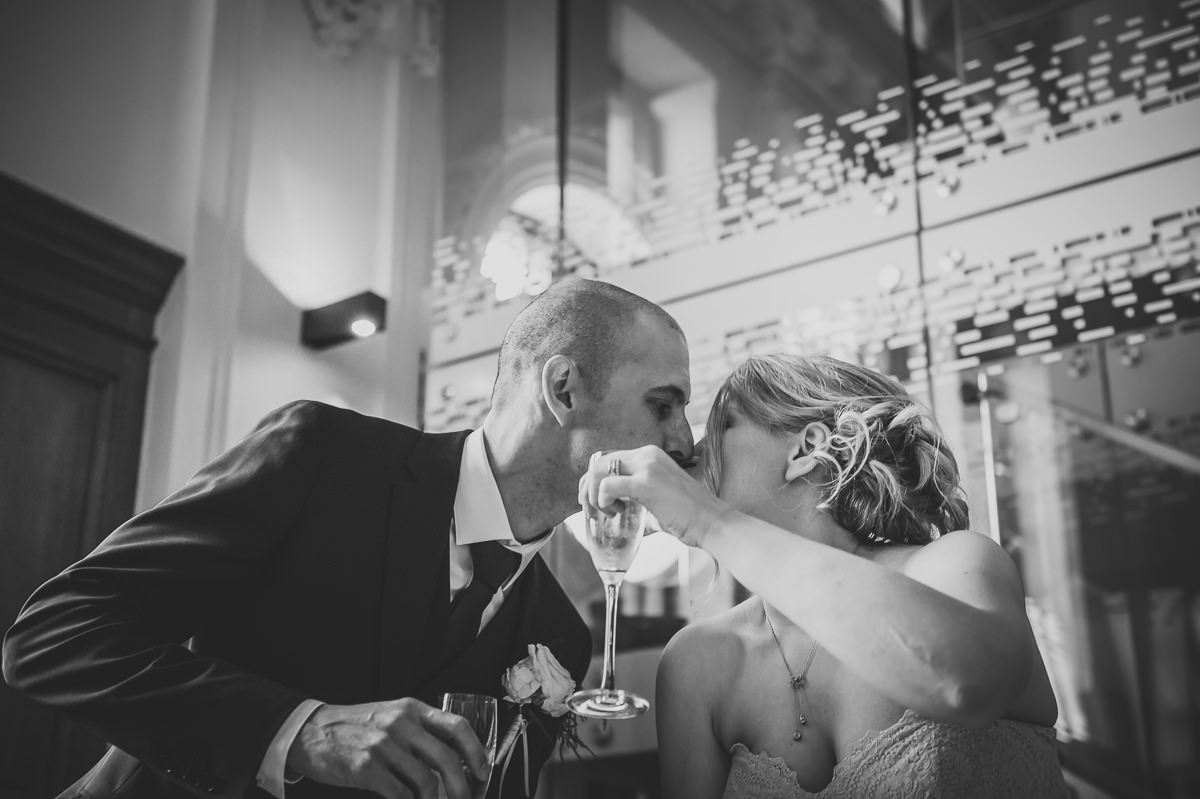 Bride and Groom kissing at their Town Hall Hotel wedding