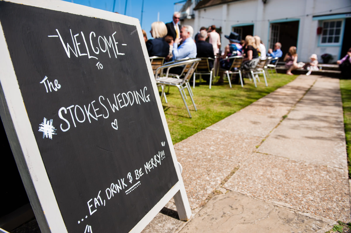 Welcome sign at a wedding at Itchenor Sailing Club