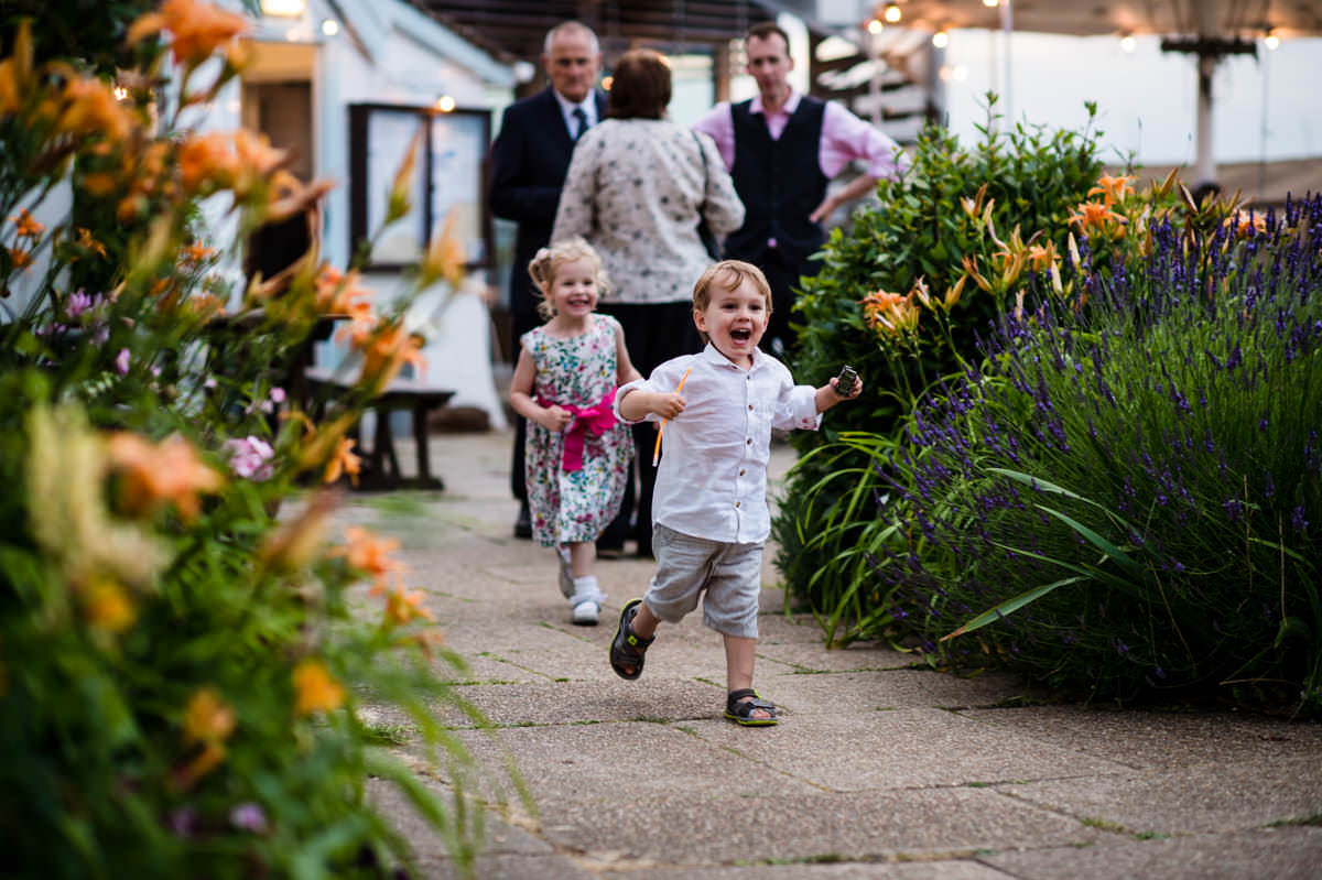 Happy children running around at the Itchenor Sailing Club