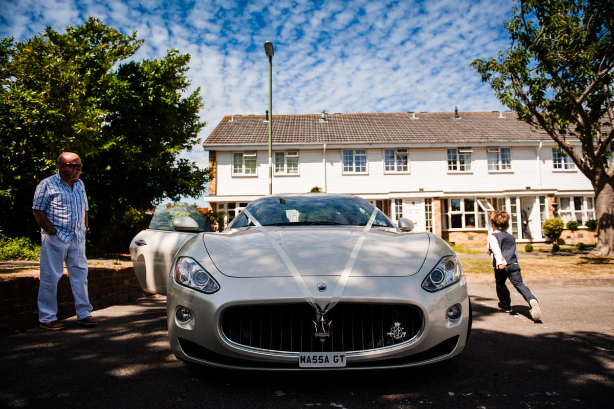 wedding maserati waiting for the groom 