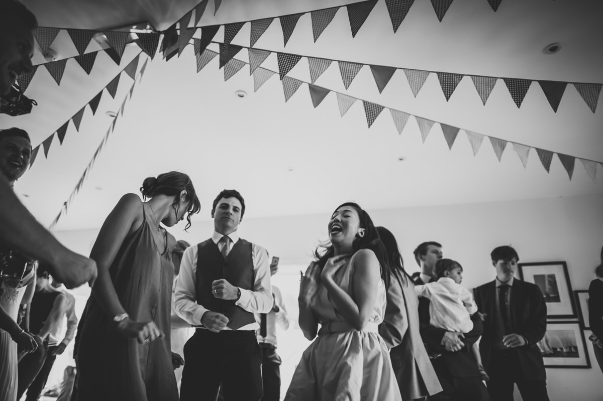 Guests dancing at a summer wedding in Sussex