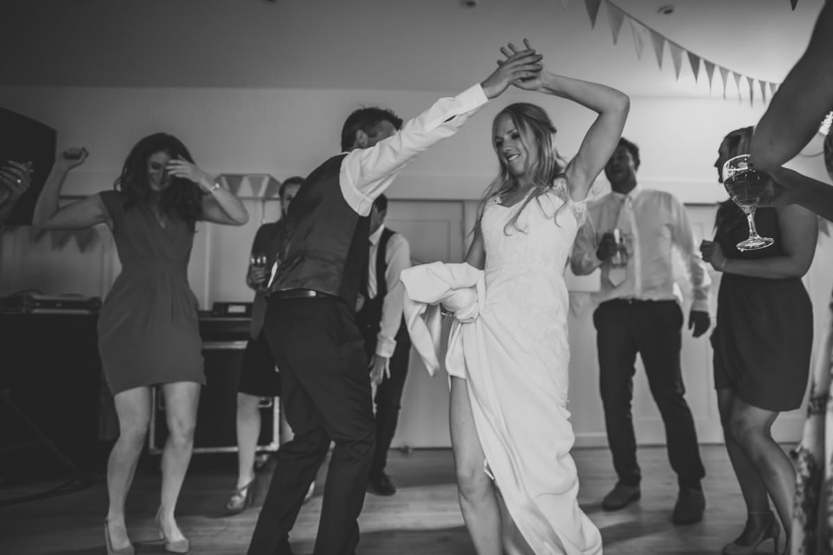 Bride and Groom dancing at their summer Sussex Wedding