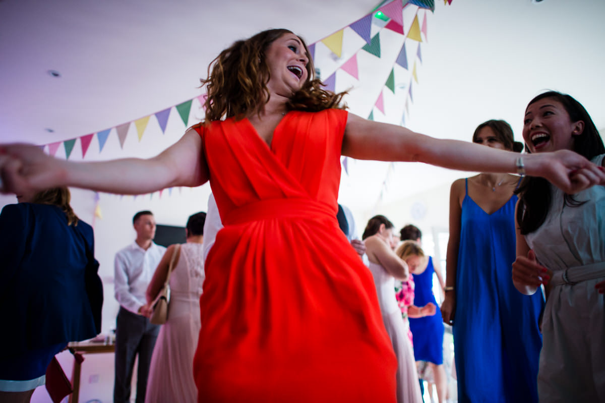 Happy guests dancing at Itchenor Sailing Club wedding