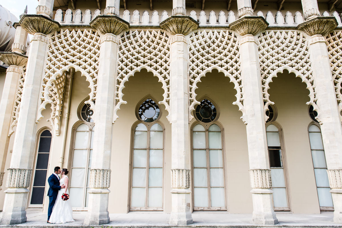 Geraldine & Dany kissing on the Pavilion terraces 