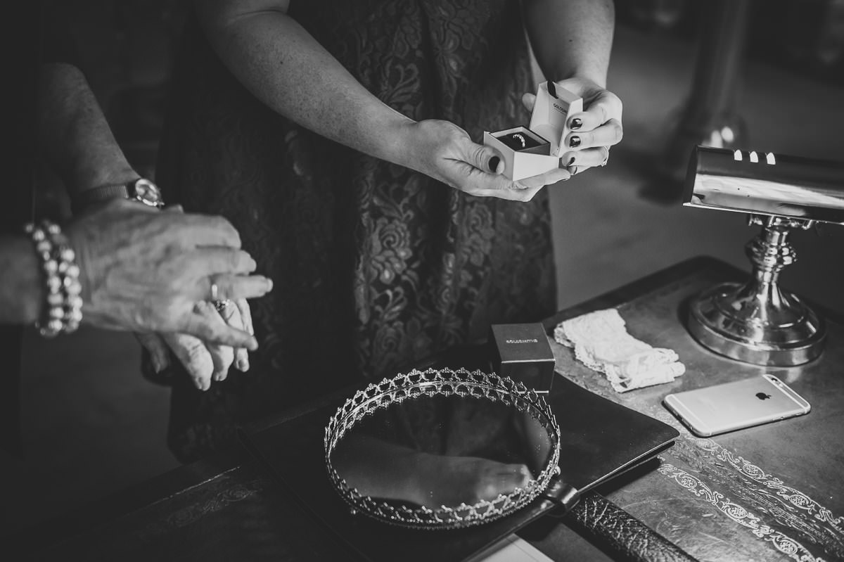 Bride's sister and mum getting their wedding rings out ready for their wedding ceremony in Brighton