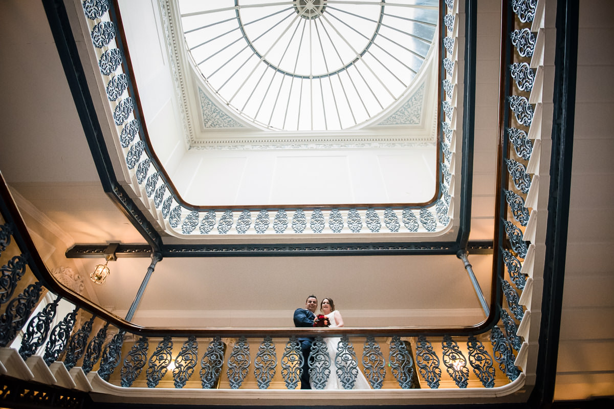 Newly weds on the famous staircase at the Grand Hotel in Brighton
