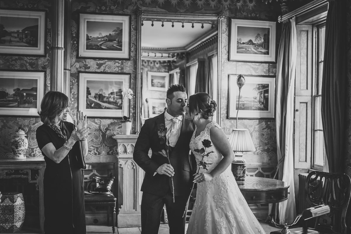 Bride and Groom kissing as newly weds