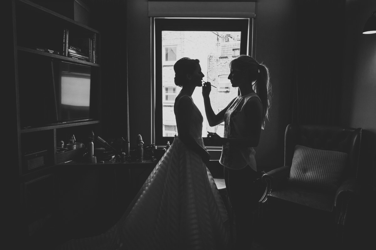 black & white silhouette portrait of bride getting ready at Hoxton Hotel Shoreditch