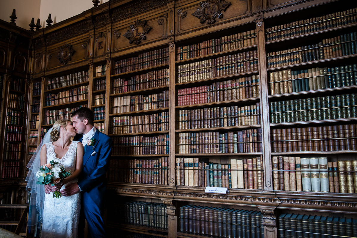 Bride & Groom in the library at Arley Hall