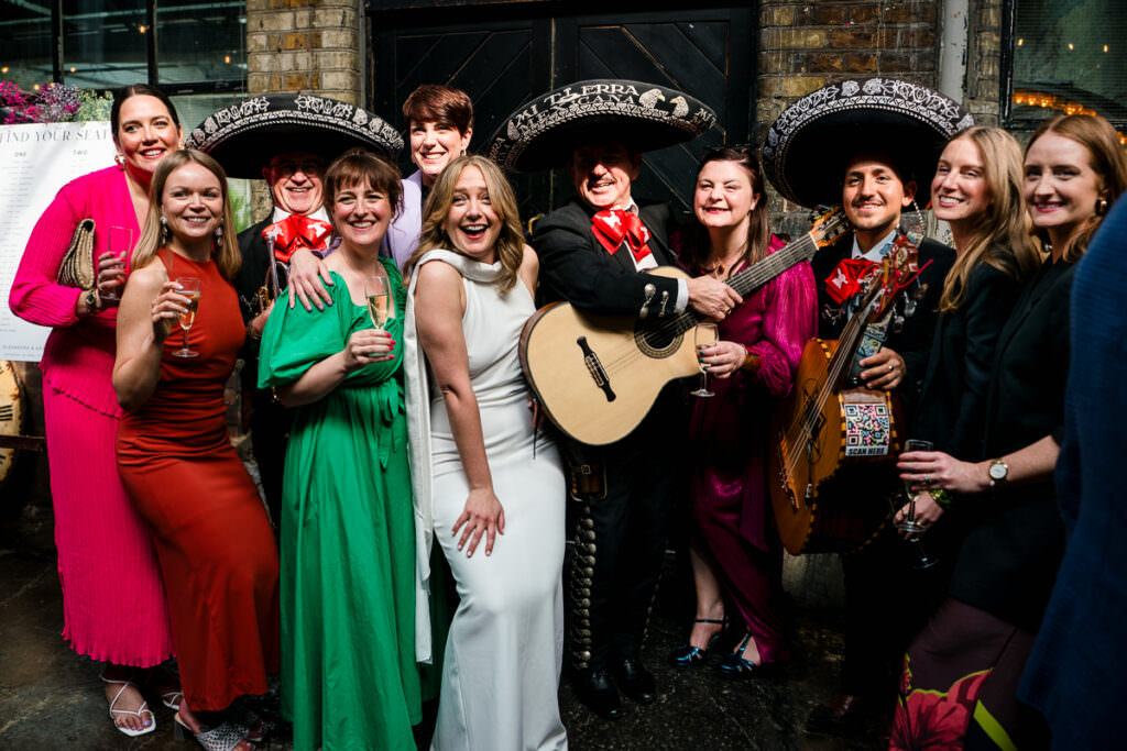 Bride with Mariachi band at their wedding at Film Shed London